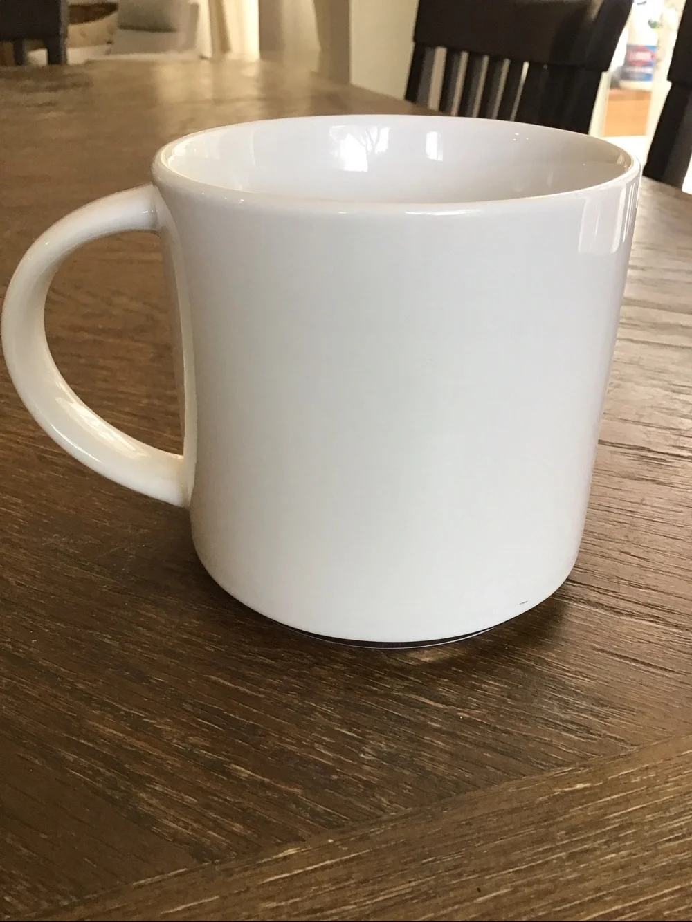 Williams Sonoma white ceramic mug features a gold-painted initial 